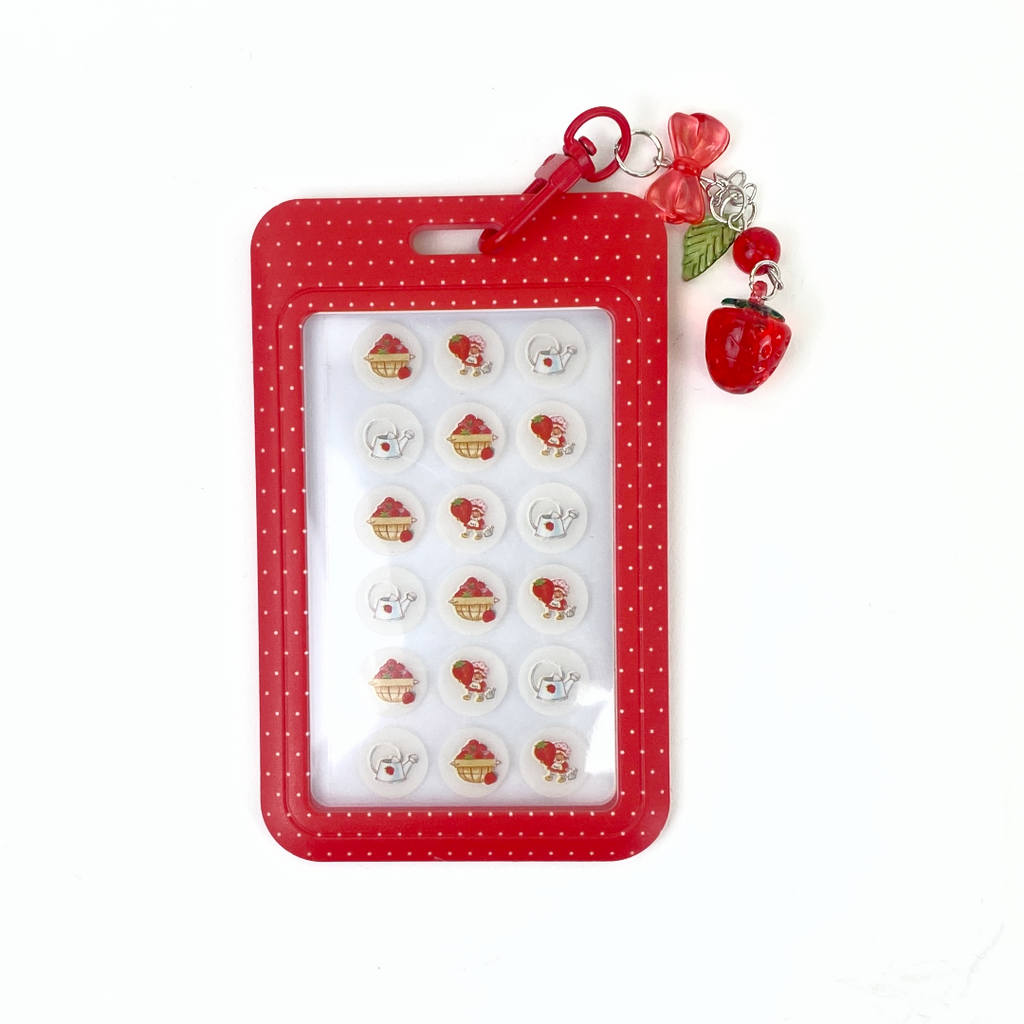 #SS46162 - STRAWBERRY SHORTCAKE 18 PC SPOT PATCHES WITH KEYCHAIN AND PATCH CASE